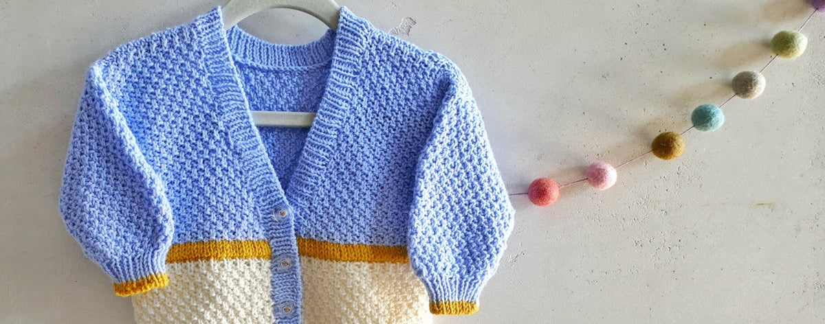Babycardigan in trendigen Blockfarben