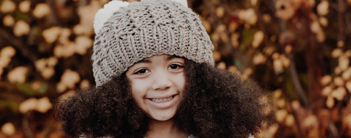 Kuschelige Pomponmütze